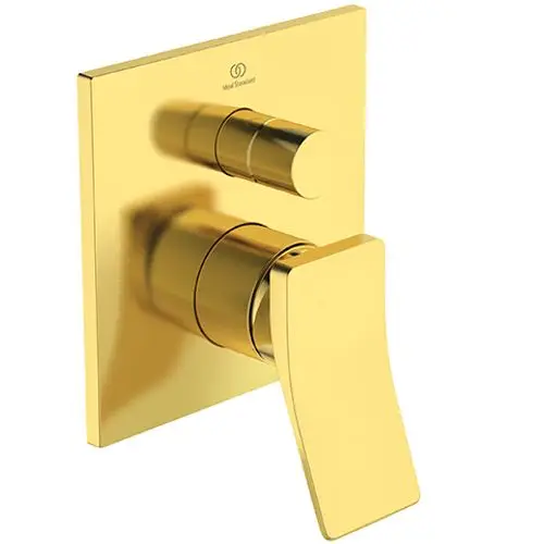 Wandmontierte Badarmatur in gebürstetem Goldfinish mit zwei Bedienelementen. Ideal Standard-Logo auf der Oberseite sichtbar.